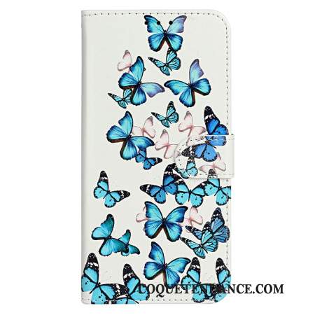 Housse iPhone 16 Plus Vol de Papillons Bleus